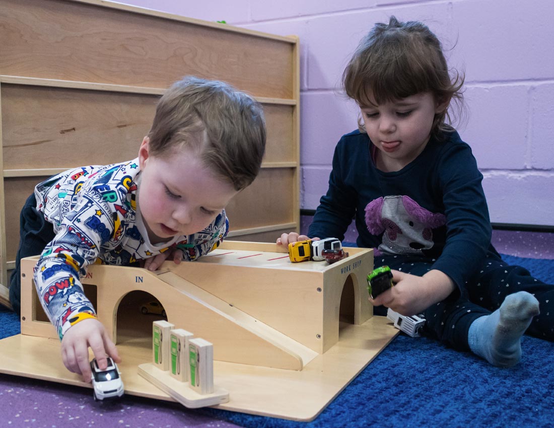 Children playing with a garage