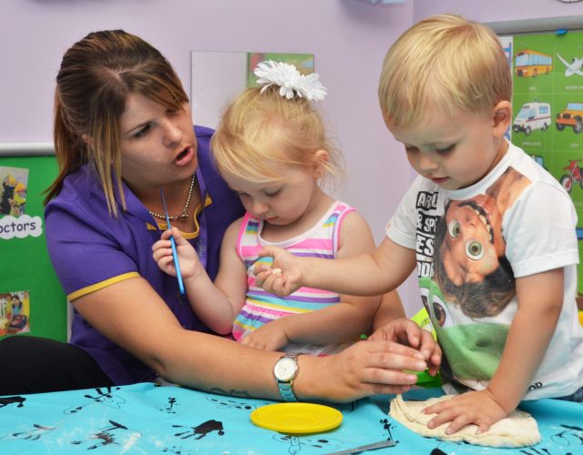 Children enjoying learning play